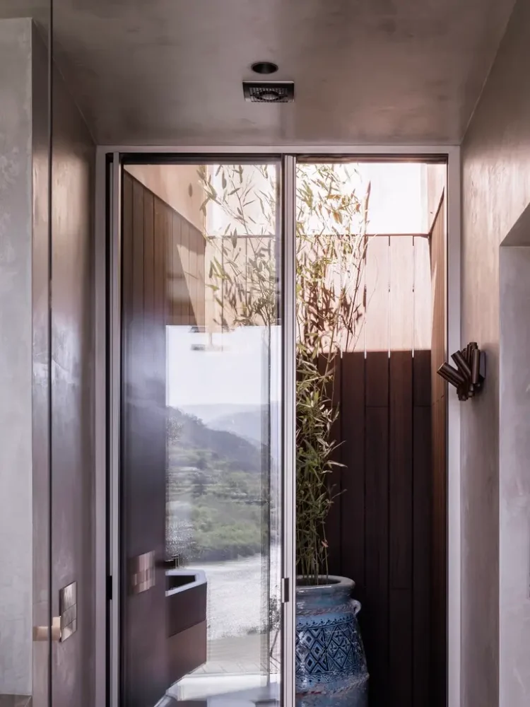 Interior winter garden in the bathroom of Douro Wood House, designed by MJARC Architects